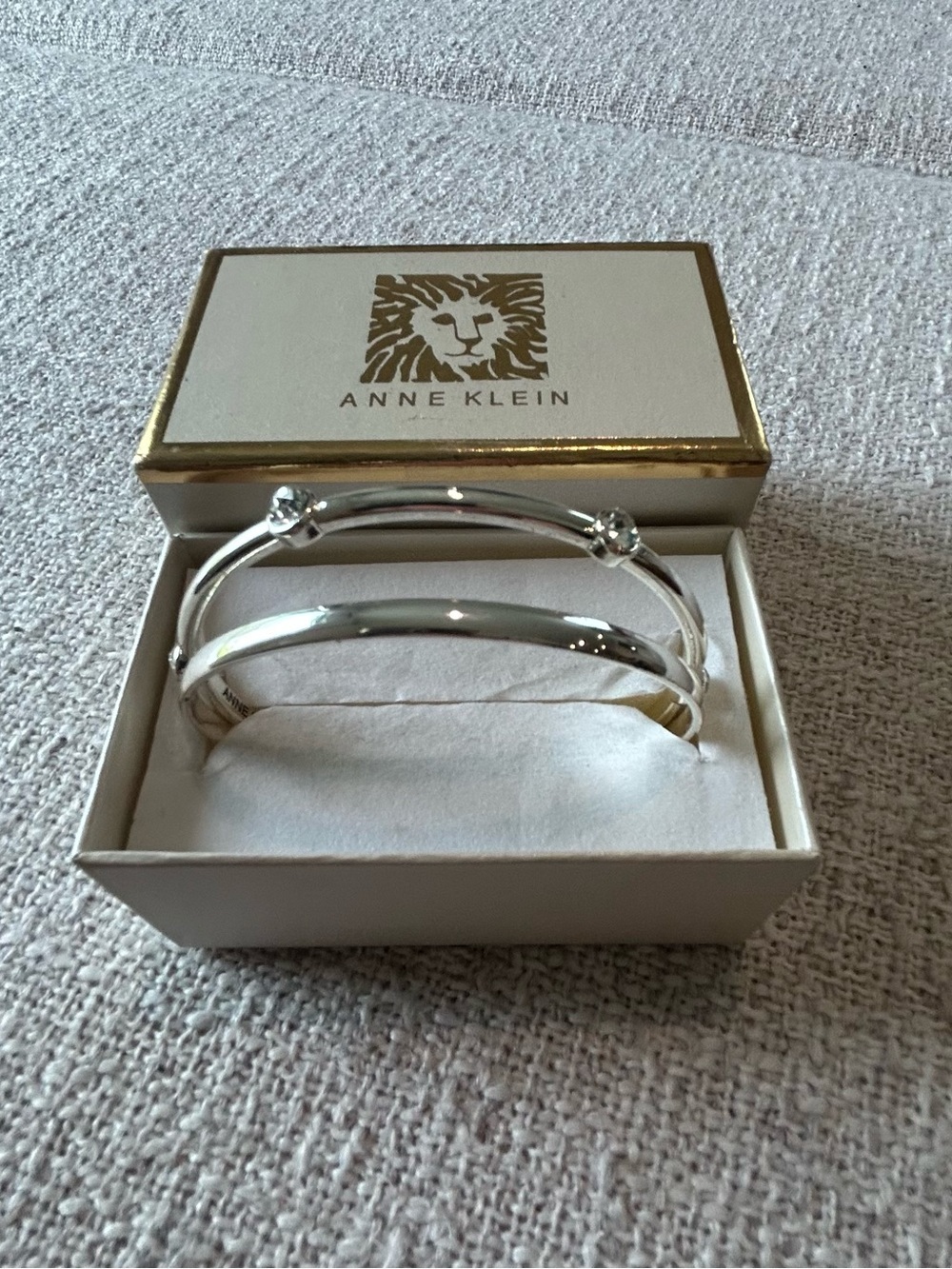 Anne Klein Shiny Silver 3-Piece Bangle Stack (one bracelet missing)